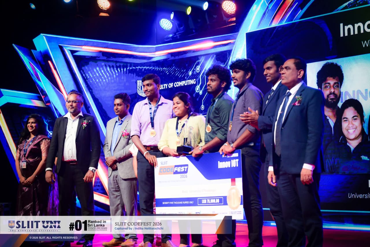 ResQ team receiving the InnovIoT first-place award on stage at SLIIT CODEFEST 2026